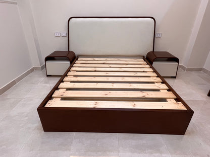 Wooden bed frame with dark brown frame and wooden slats on a tiled floor.